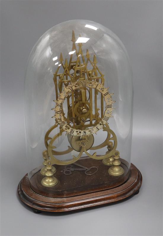 A Victorian brass skeleton clock under dome overall height 40cm